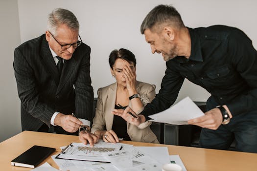 image of a young professional looking at financial documents