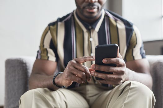 person using budgeting app on smartphone