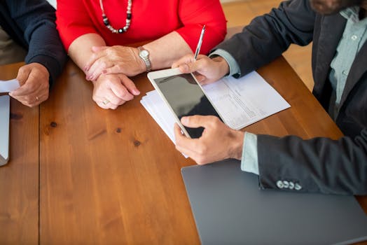 image of financial advisor consulting a client