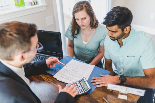 a young professional reviewing budget plans