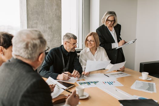 diverse group of professionals discussing finances