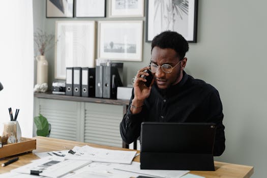 self-made millionaire at work